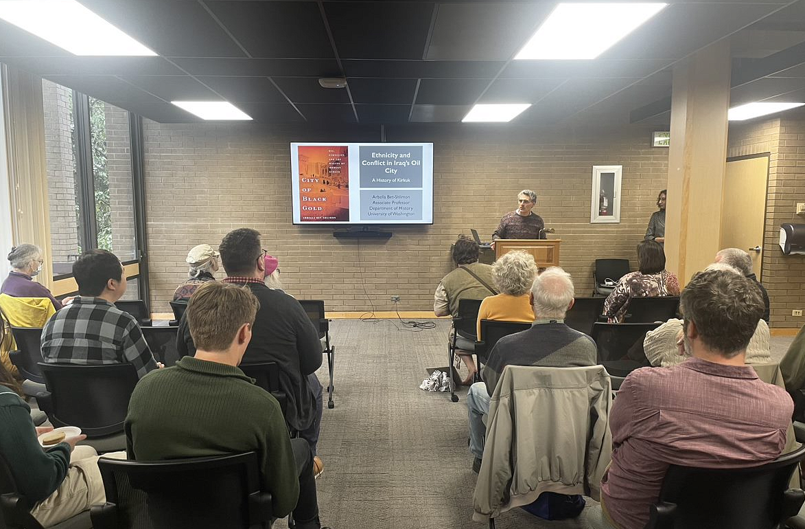 A professor speaking at a department seminar