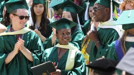 2013 International Studies Graduates Andrew Howe, Assa Sylla and Jean Faye in graduation gowns