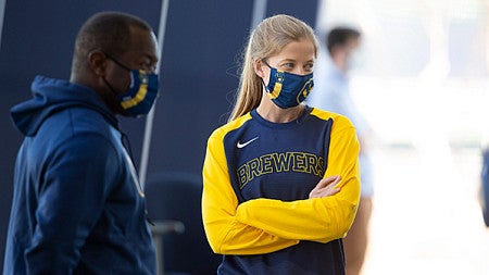 Sara Goodrum with Quinton McCracken of the Milwaukee Brewers during spring training