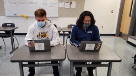 students at a desk