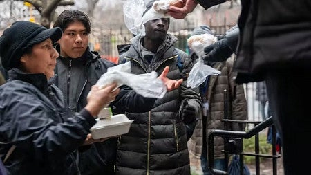 people handing out food