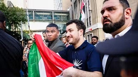 a person holding a flag