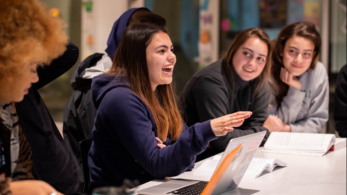 students collaborating at student meeting