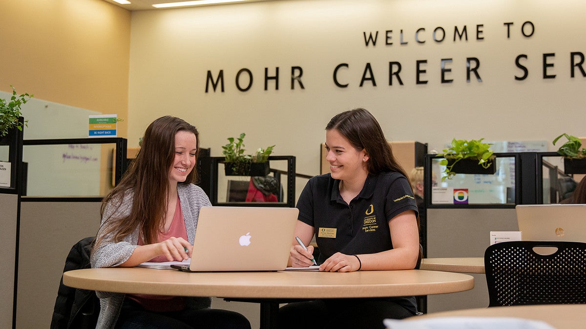 two women talking at the career center