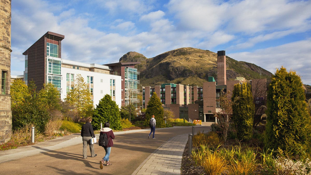 people walking on a path in Edinburgh, Scotland