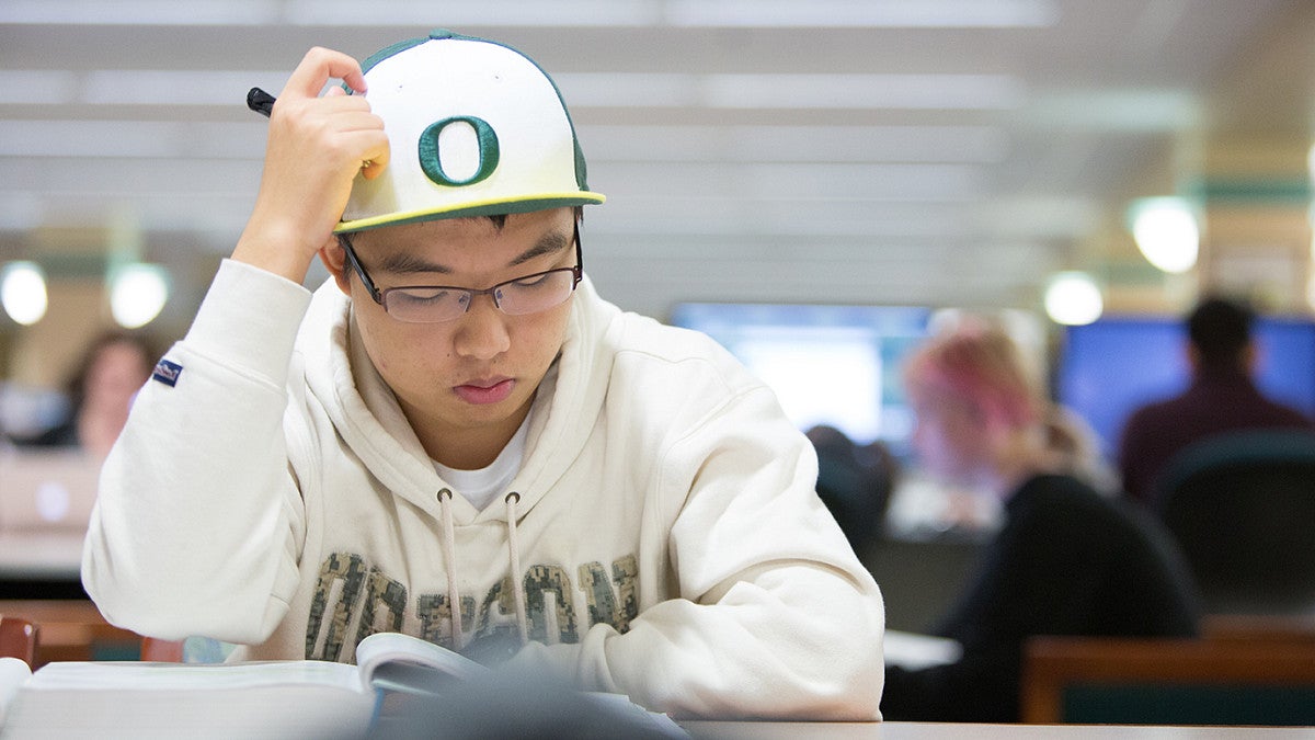 student reading studiously