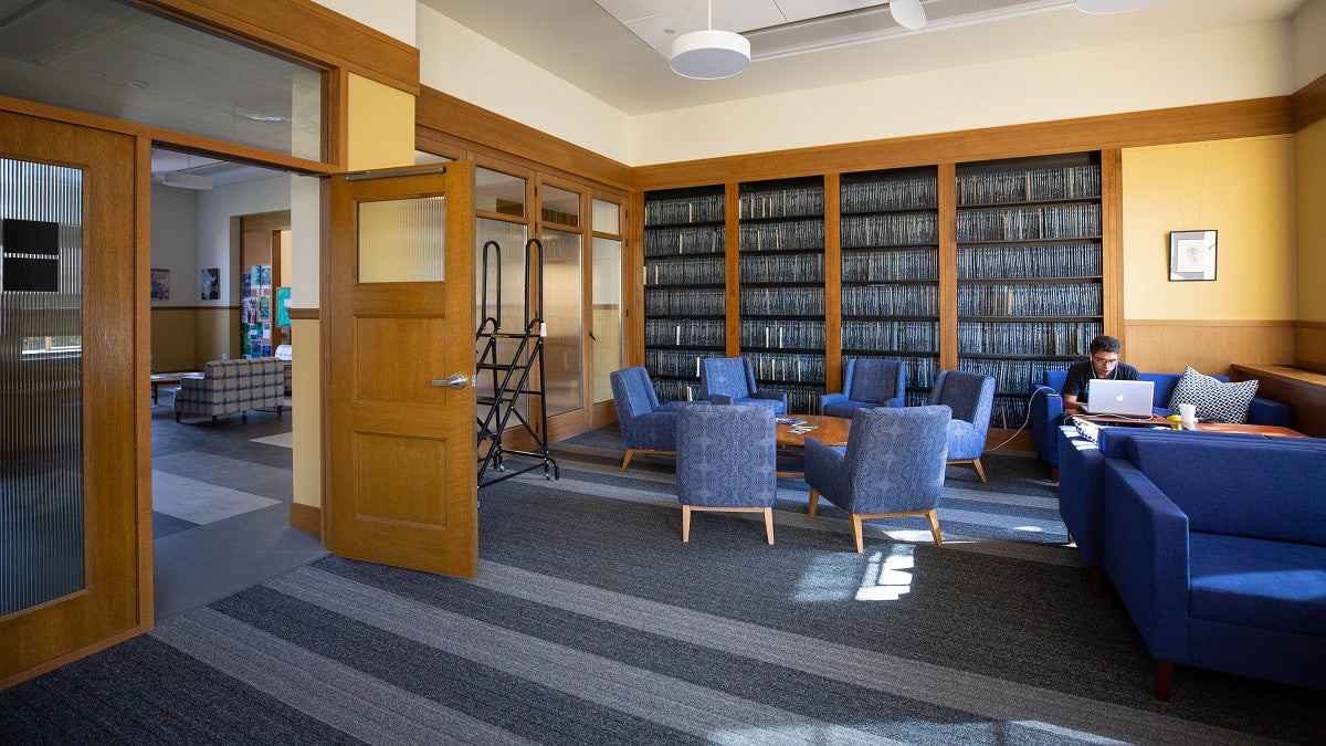 student studying in library