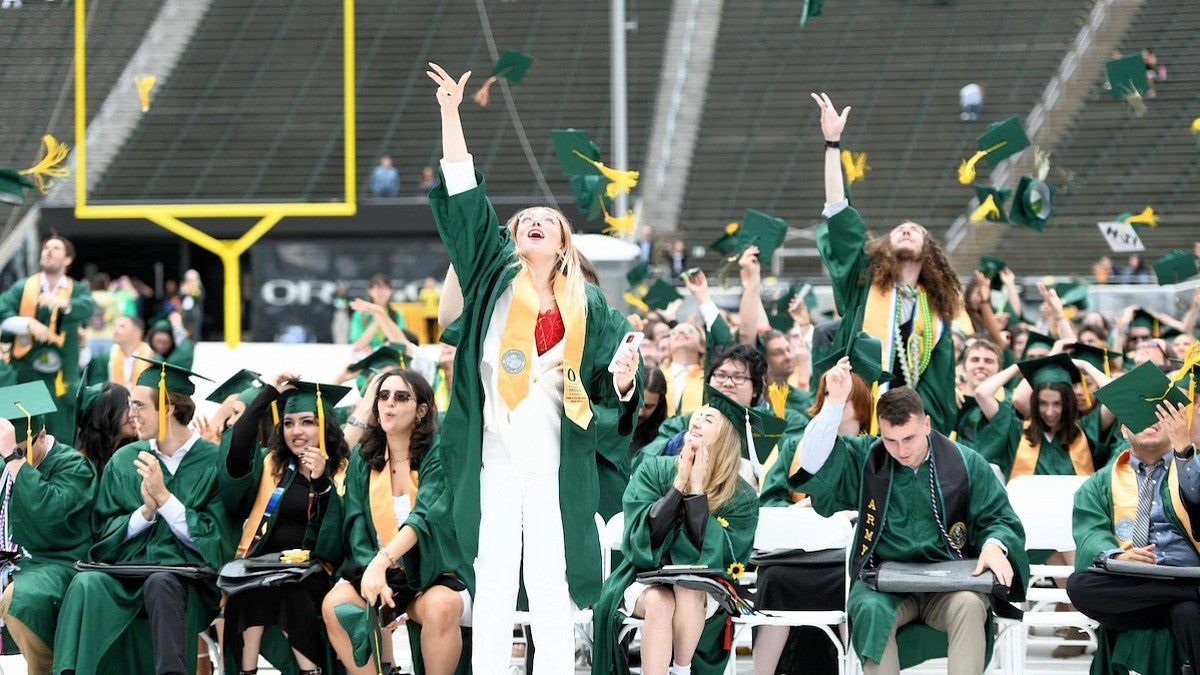 CAS 2023 Commencement: Students throwing hats