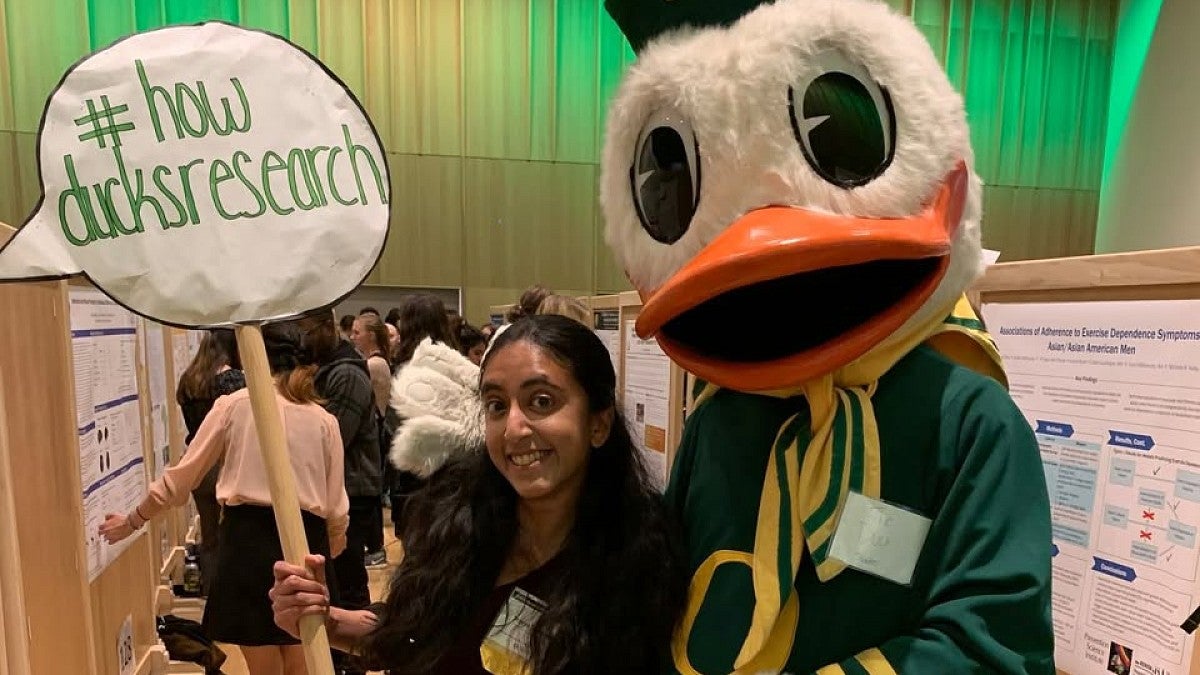 Sravya Tadepalli poses with the Oregon Duck