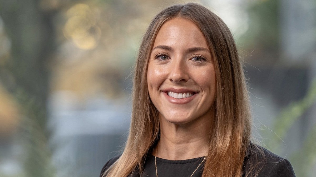 a headshot of Ashley Cordes