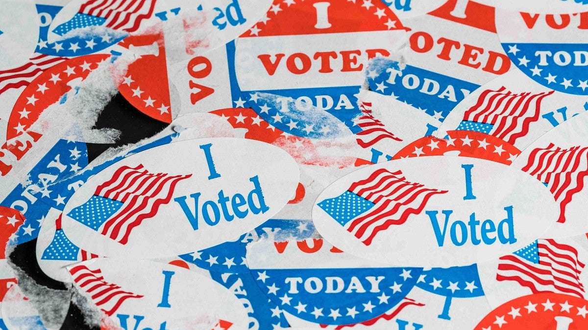 a collage of "I Voted" stickers