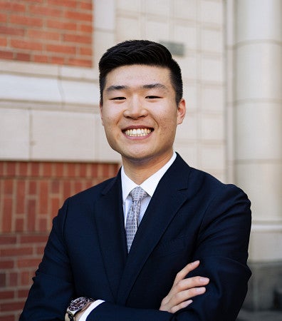 Sociology student Ethan Yin smiling in portrait