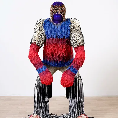 Photo of an art piece by Choctaw artist, Jeffrey Gibson, "Untitled Figure 1"