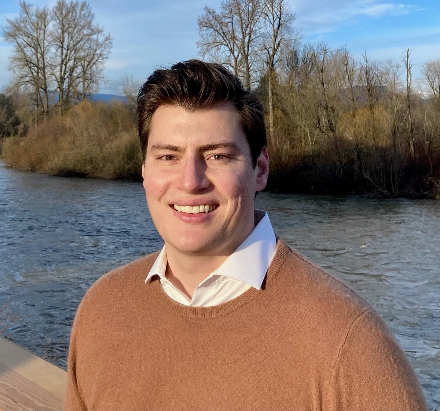 Reilly Kompaneit standing near a river