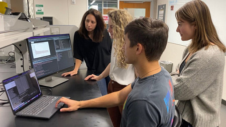 Professor Kirstin Sterner, Elisabeth Goldman, doctoral student Tanner Anderson and Clark Honor’s College student Maili Smith reviewing some recent results of the epigenetics and aging project in the Sterner Lab.