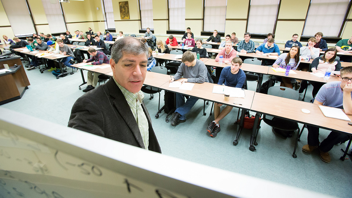 Professor Tichenor teaching a classroom of students