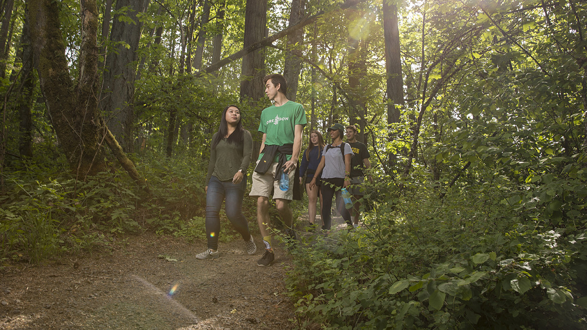 students hiking outdoors