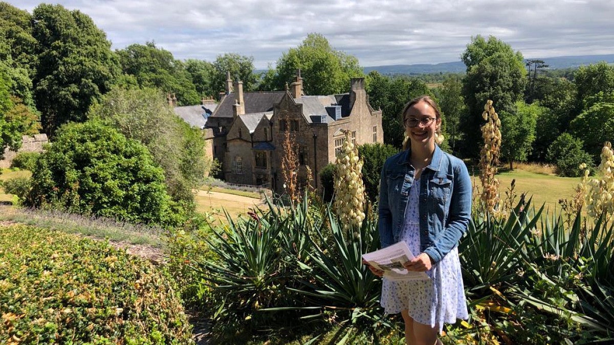 Graduate student Michele Pflug researching in the field