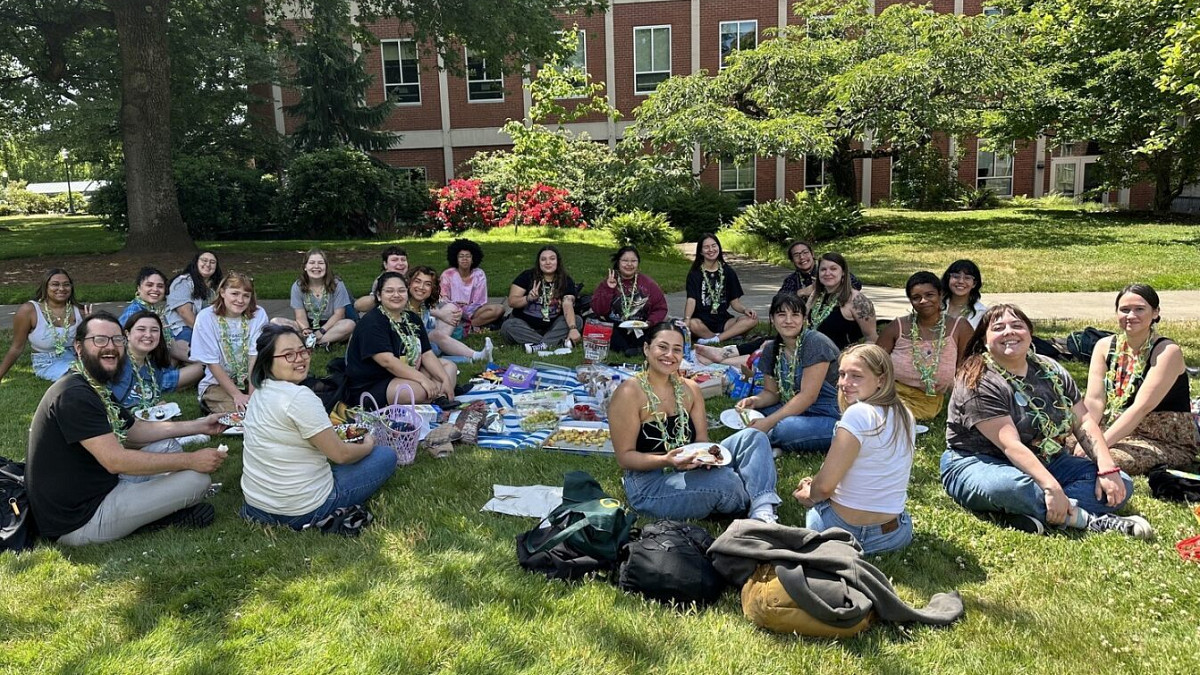 Group of students sitting on the lawn