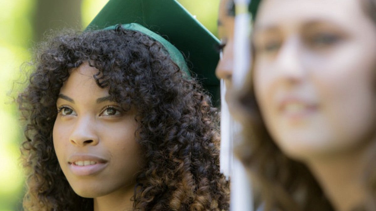 Student graduating at the IRES commencement ceremony